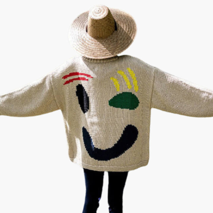 Unisex stickad tröja med konstnärligt smiley-motiv för avslappnad stil och vardagskomfort