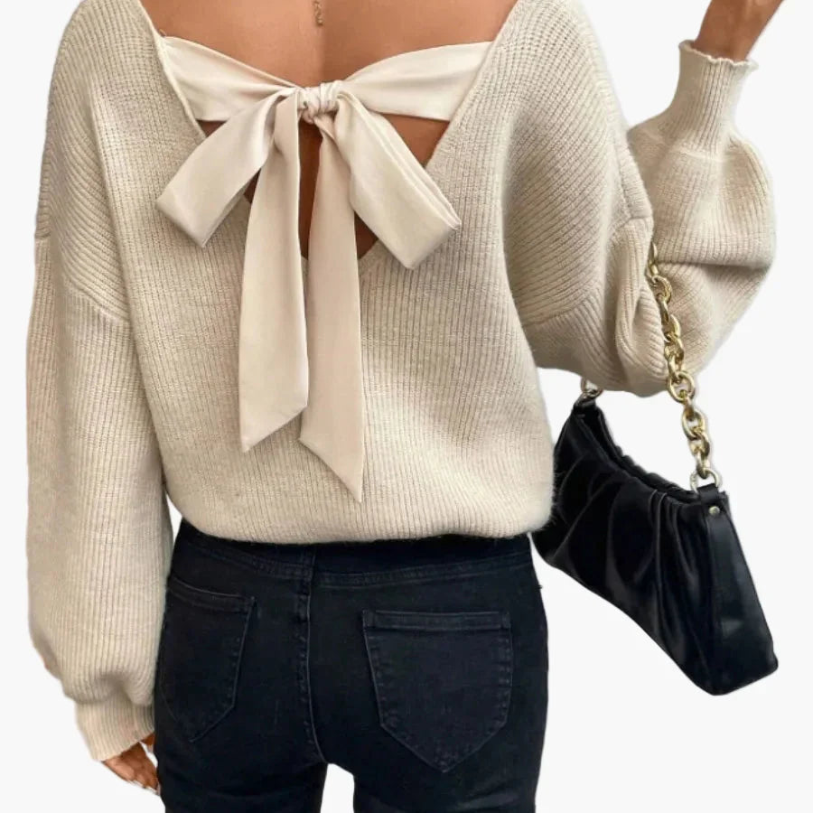 Kvinnors trendig stickad tröja med öppen rygg och rosett – perfekt för vardag och fest